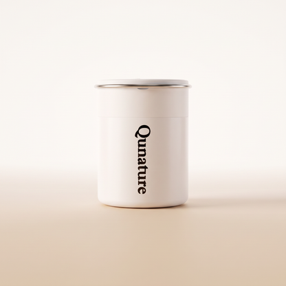 The white Qunature Atomic Pump seen from the front on a plain cream background :: White