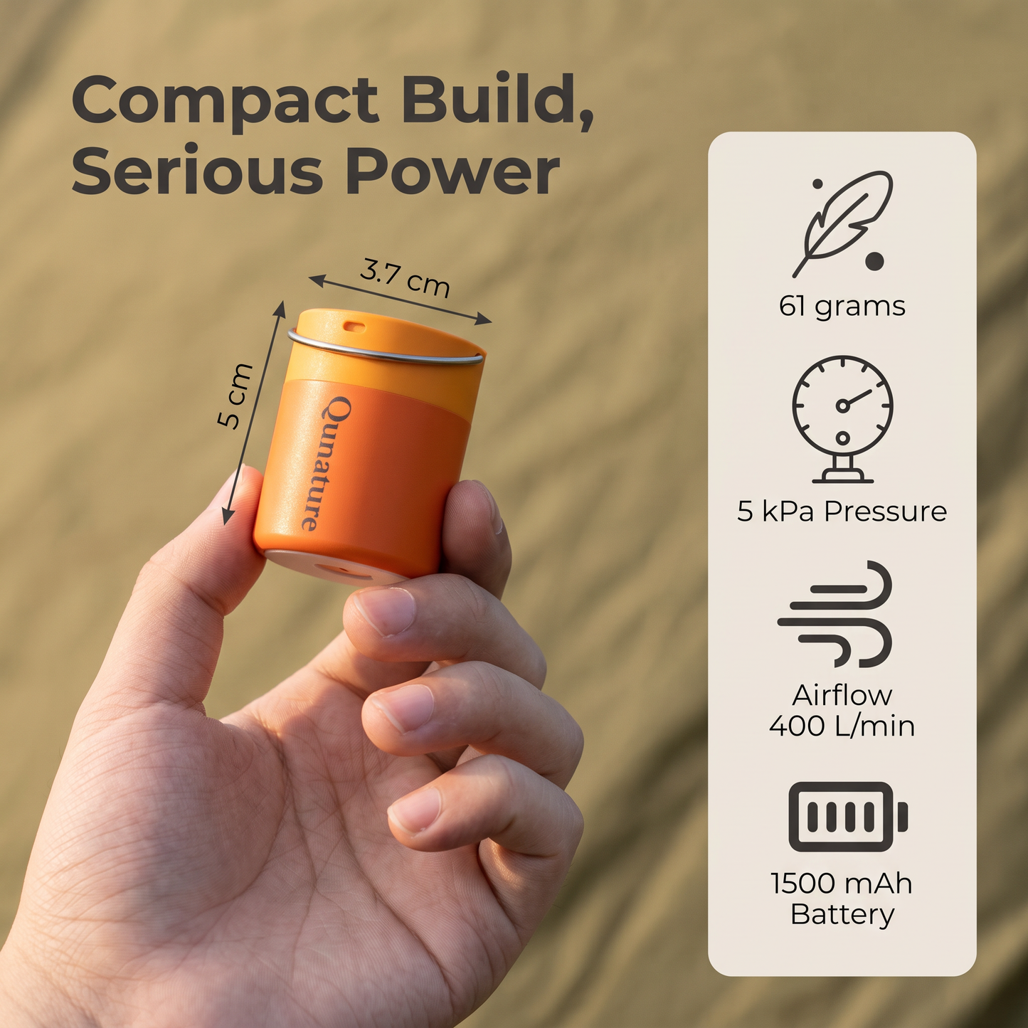 The pump held in one hand, marked 3.7 cm across and 5 cm tall, beside its 61 g weight, 5 kPa pressure, 400 L per minute airflow and 1500 mAh battery :: Orange