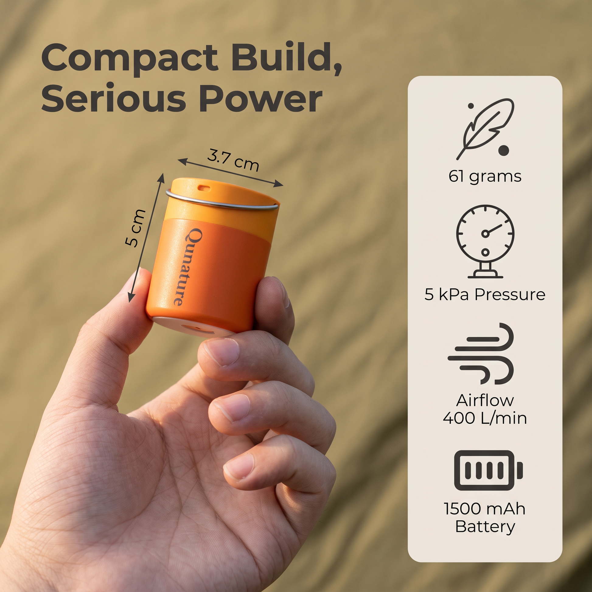 The pump held in one hand, marked 3.7 cm across and 5 cm tall, beside its 61 g weight, 5 kPa pressure, 400 L per minute airflow and 1500 mAh battery :: Orange