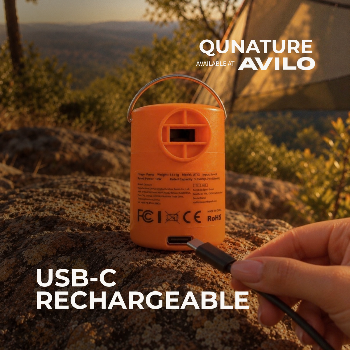 A USB-C cable plugged into the base of the orange pump to recharge it