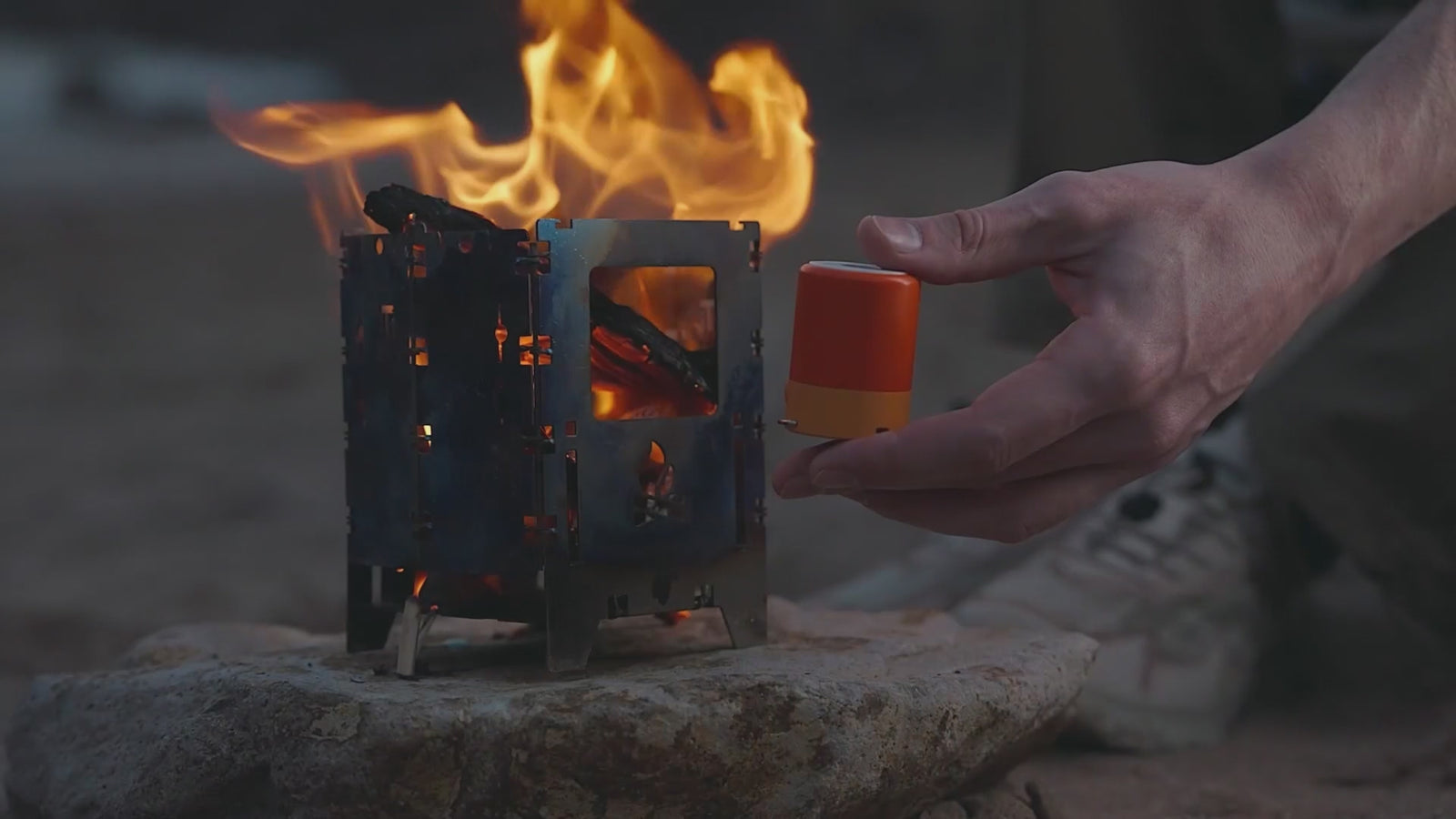 The pump breathing a campfire into life at dusk, charging over USB-C, hanging from a camp chair, and held magnetically inside a car bonnet.