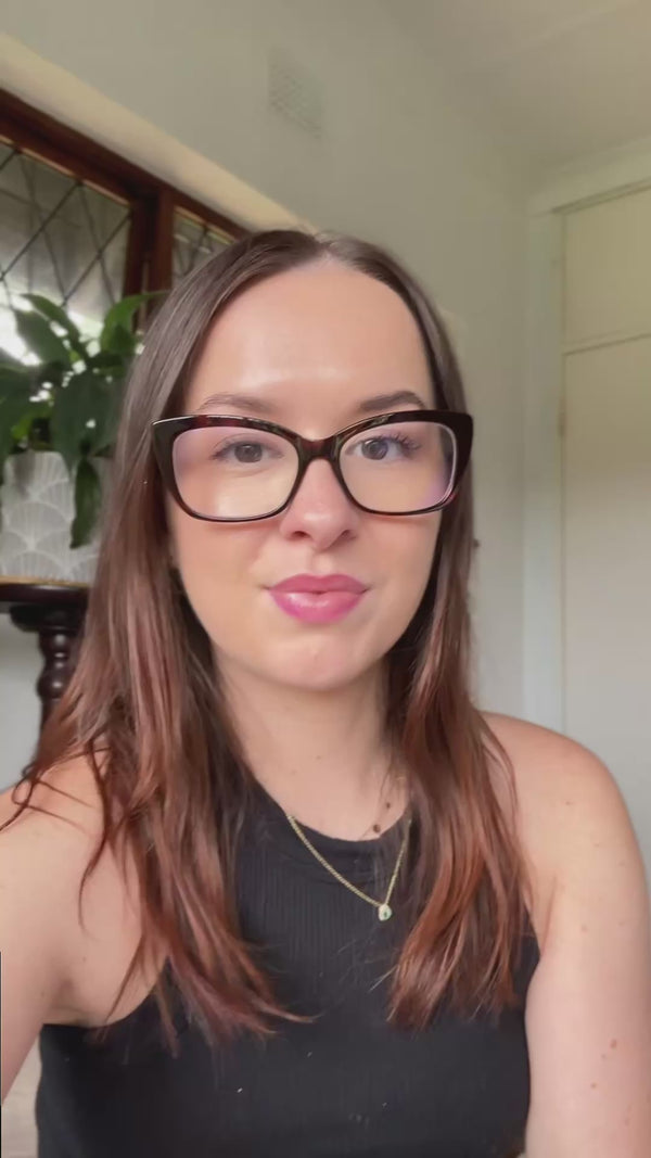 A customer talks to camera indoors about how she uses her Avilo flask.